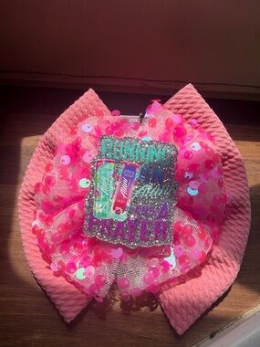Pink Sequin Floral baby Bow on nylon with Alani acrylic charm